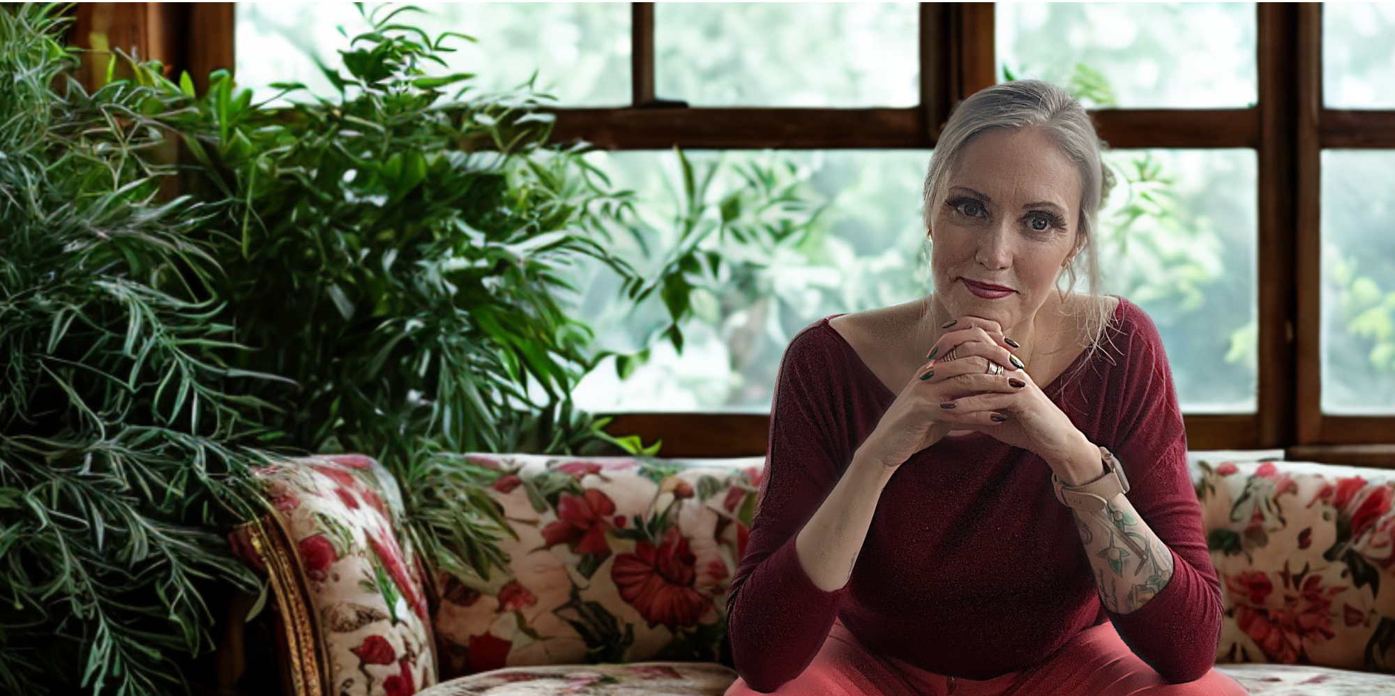 Heather McDonald sitting calmly with hands clasped — the person everyone relies on, carrying more than others see